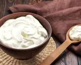 Crème diplomate mascarpone on a wooden table, ready to be used in a delicious dessert.